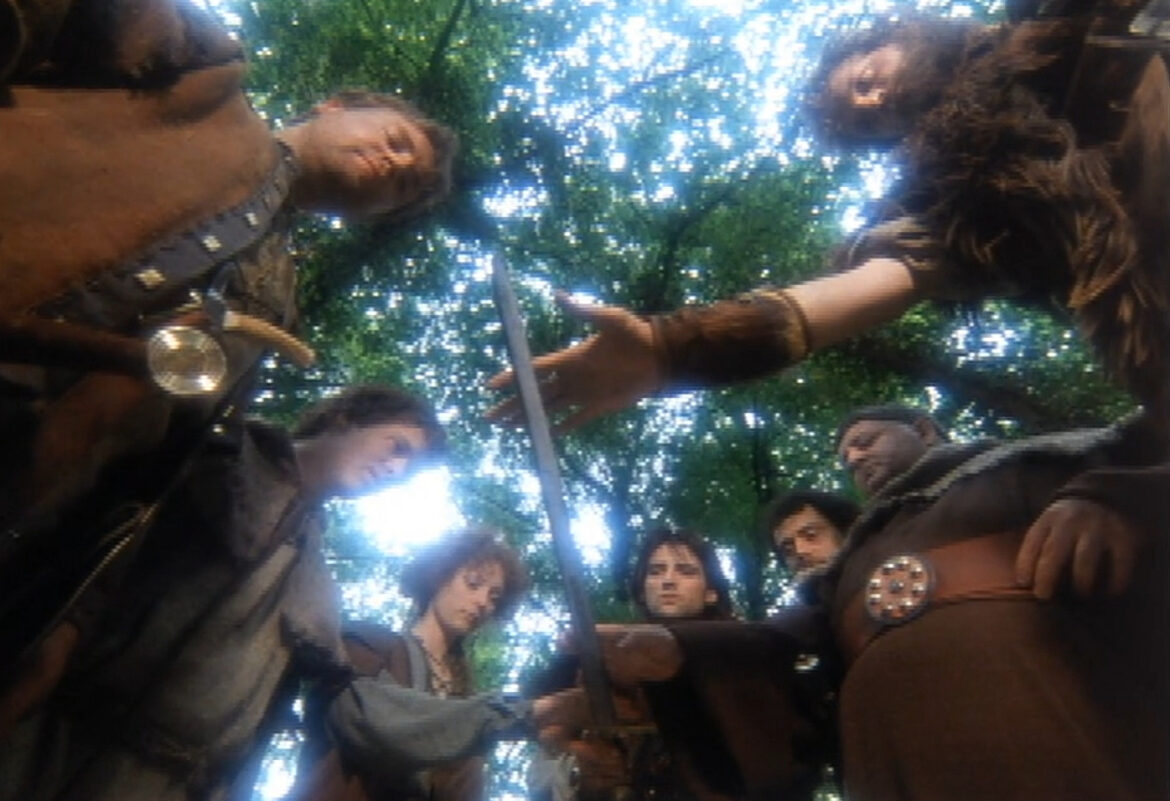 Robin Hood and his merry band swearing allegiance on his sword, Albion.
